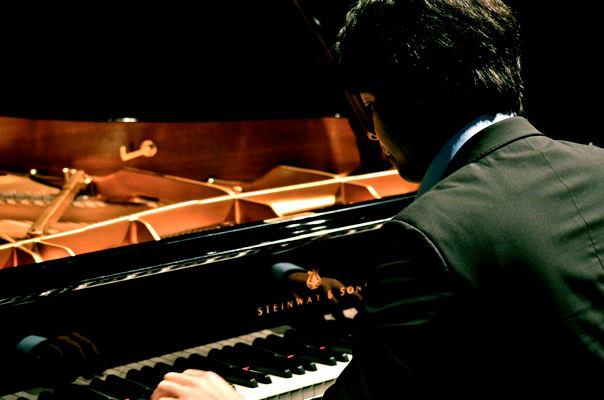 Terence Marais plays the piano. 